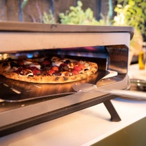 Cozze 13 Inch PIzza Oven and Pizza Cutter Pack CZ90363PK hero image